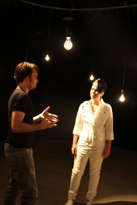 Dir. Matthew Walker working with singer Angie Raess on the set of her new music video, 