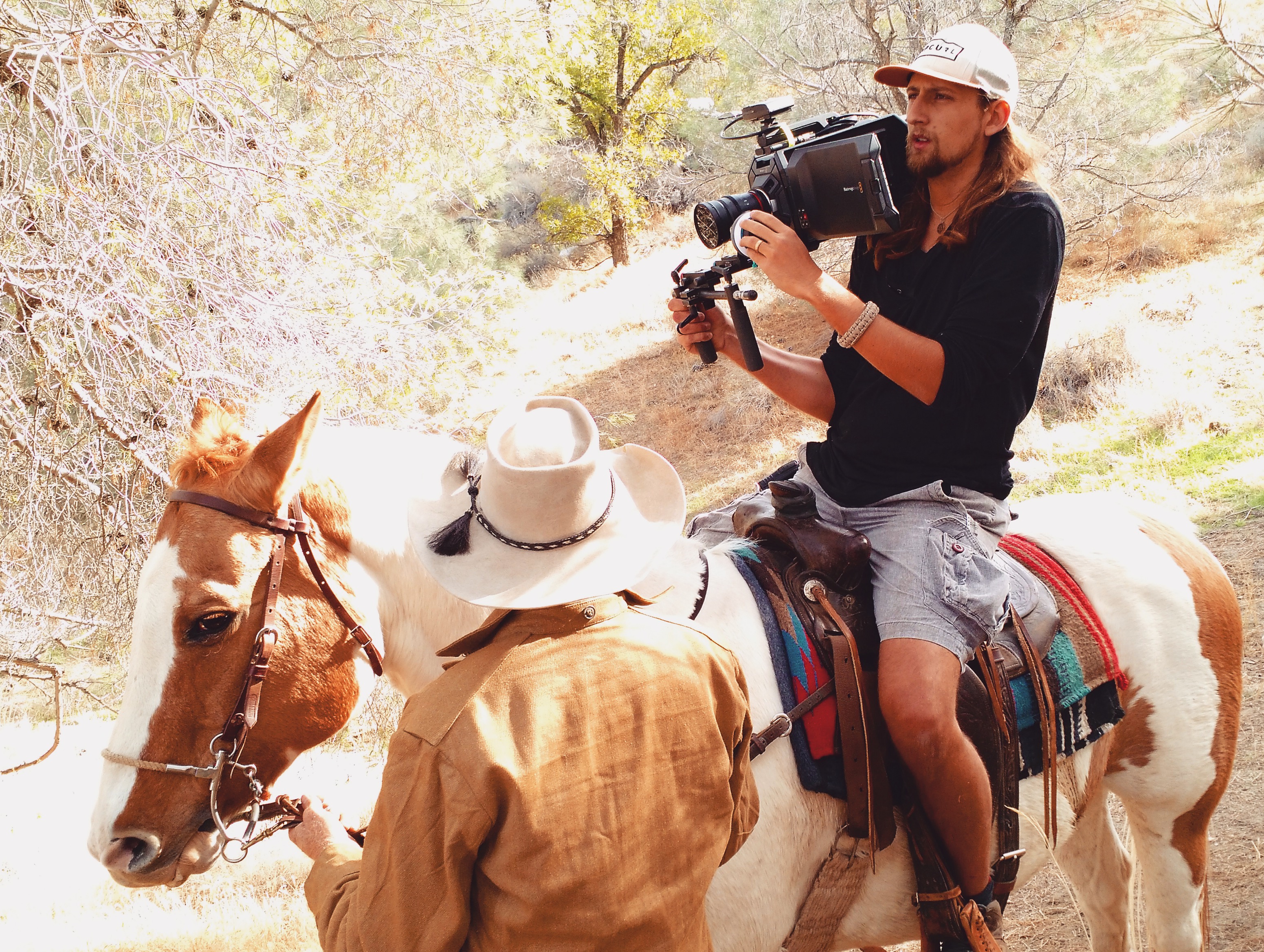 Lukas Colombo Directing from a Horse on the set of 