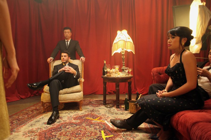 On set Photo of Bradley Castillo, Tzi Ma, and Vyvy Nguyen in Made in Chinatown.