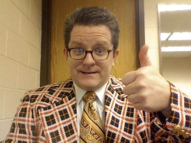 Lance A Schart as Mitch E Conley, hack sportscaster, QWERTY The Movie