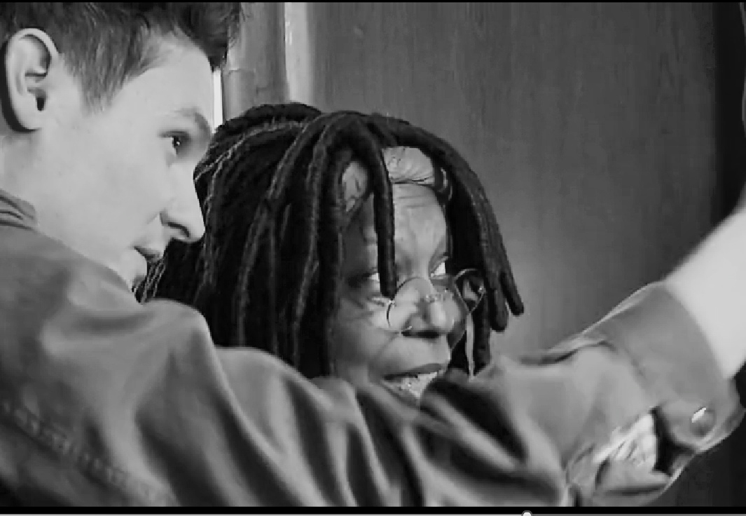 Jon Matthews and Whoopi Goldberg on the set of Black Dog, Red Dog.