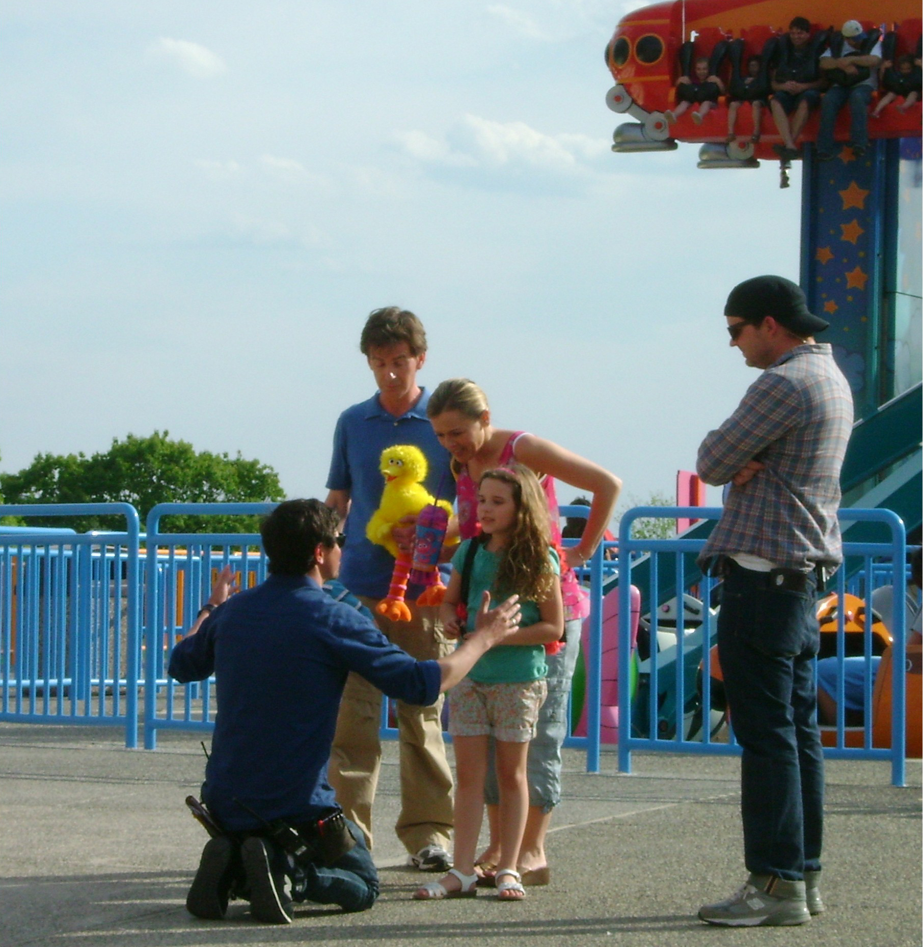 Still image of Jodie Shultz and co-cast Joe Mathews and Leila Davis on the set of Sesame Place.