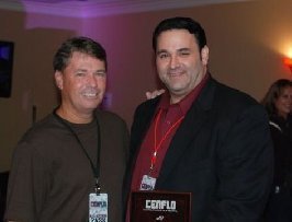 Director and Producer of The Mandala Maker Sam Borowski winning Best Mini Feature Award at the Central Florida Film Festival, Sept 6,2009 with writer, Chase Chenowirth.