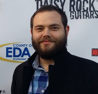 Producer Nicholas Andrew Halls at the Idyllwild International Festival of Cinema media wall before 54 Days' US premiere.