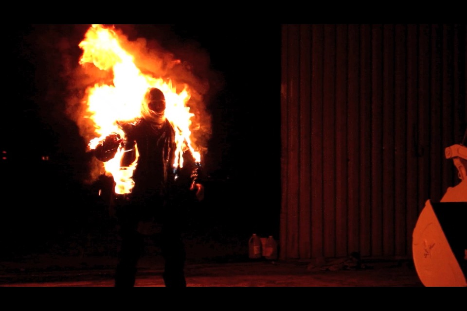 Still of Ian McMurray in fire burn stunt.