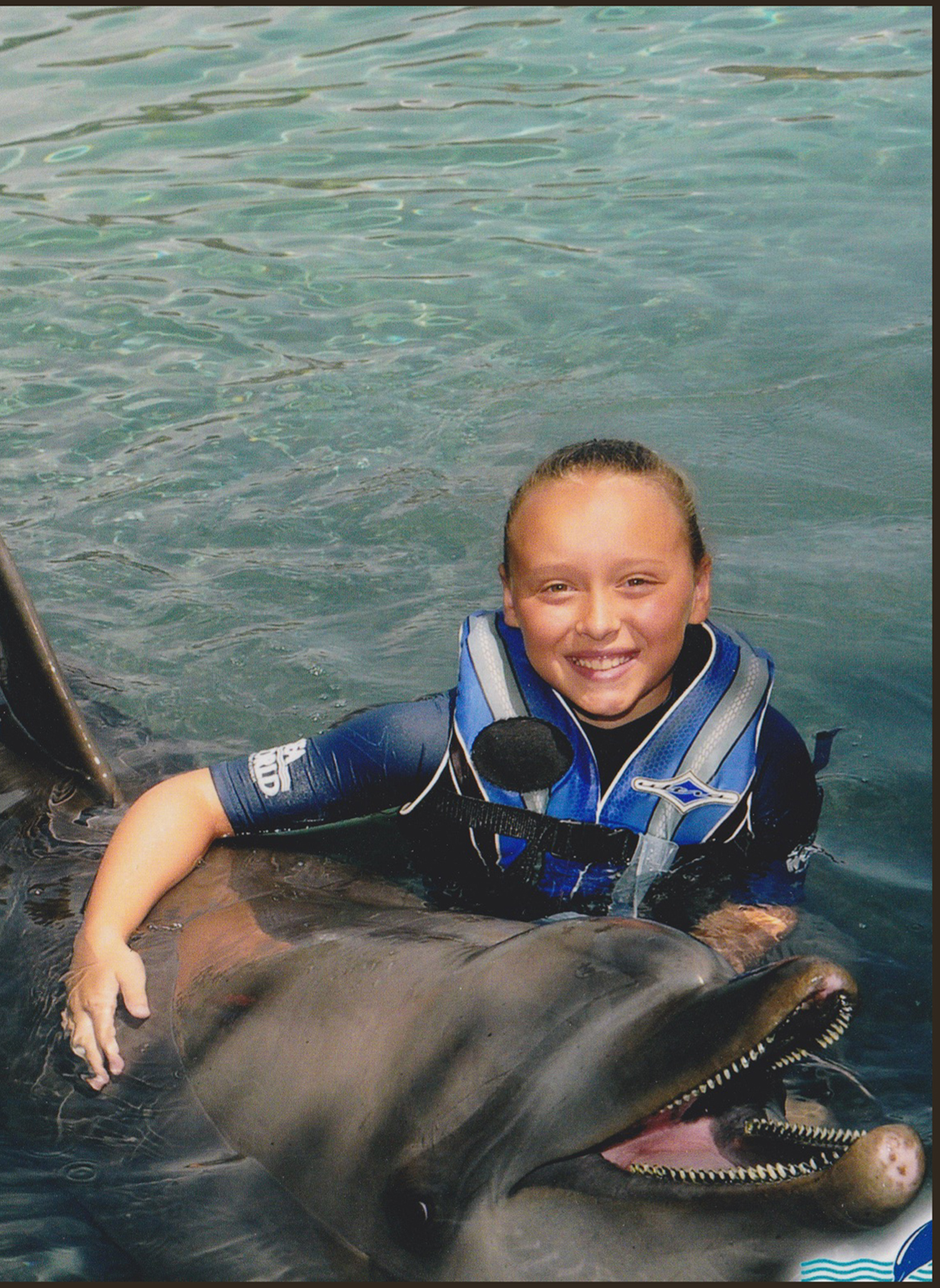 Piper swimming with Dolphins