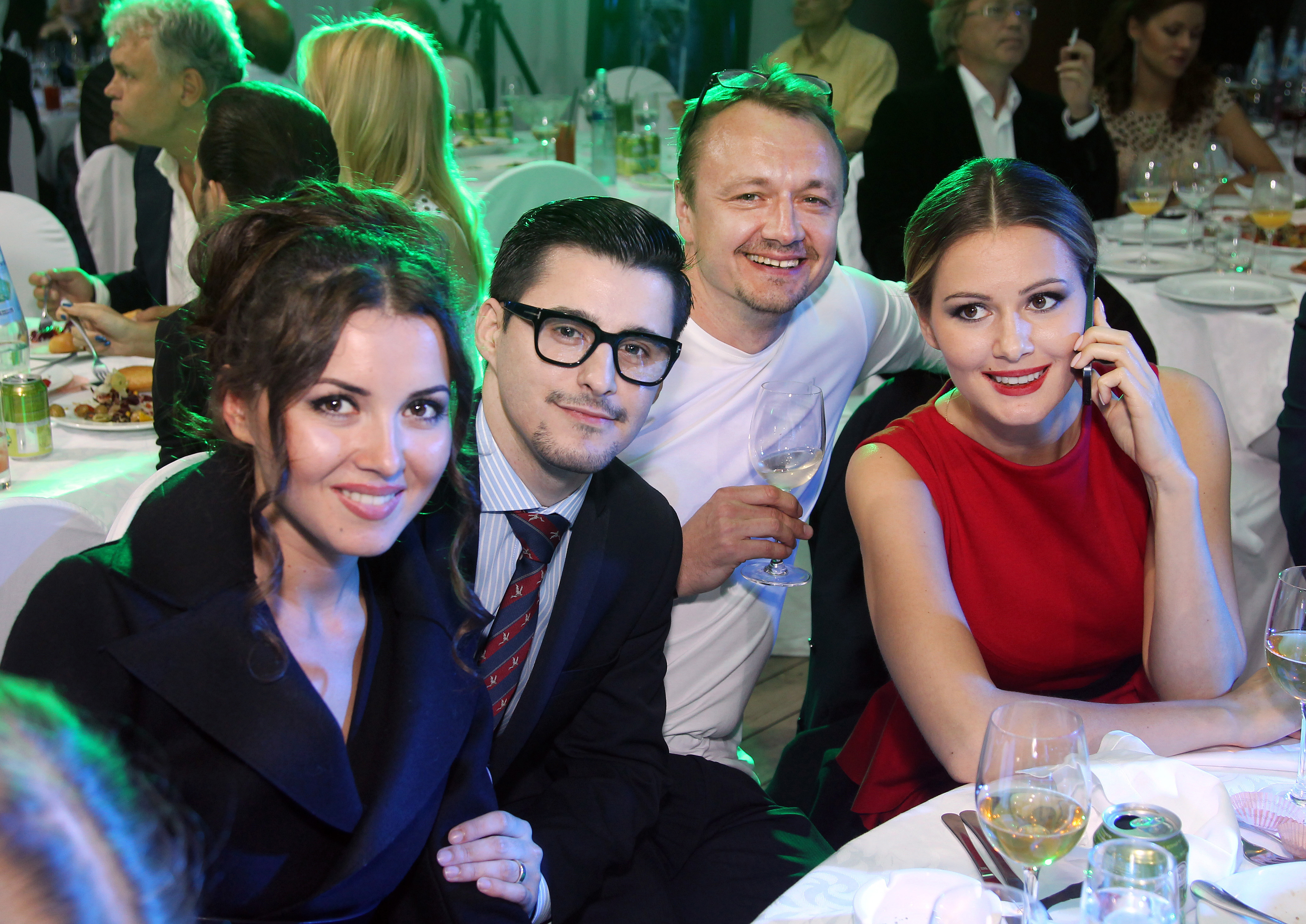 (L-R) Actress Alesa Kocher, producer Josh Wood, a guest (C) and Duma deputy, actress Maria Kozhevnikova (R) attends the 35th Moscow International Film Festival After Party on the opening night on June 20, 2013 in Moscow, Russia.
