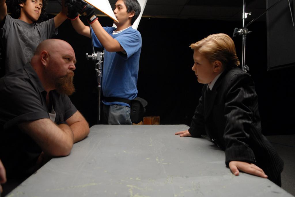 Zach with co-star interrogation scene.