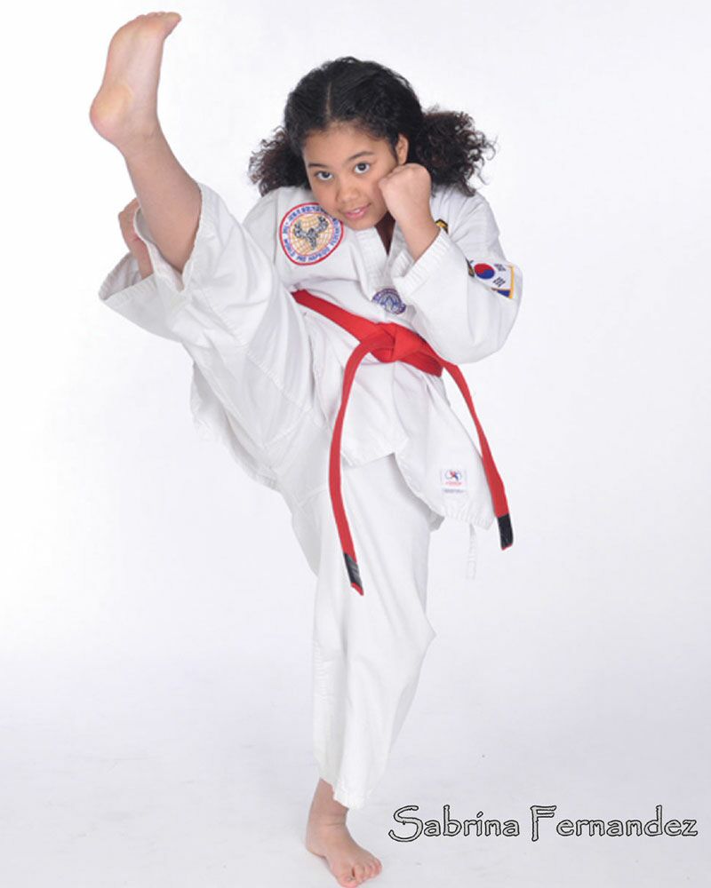 Sabrina receives her Red Belt in Hopkido Karate in 2010.