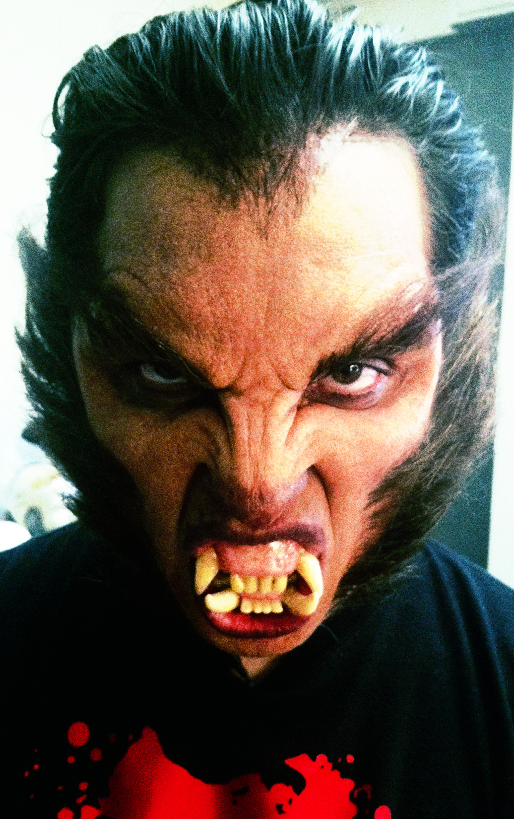 Tony E. Valenzuela in werewolf make-up by Barney Burman. (2011)