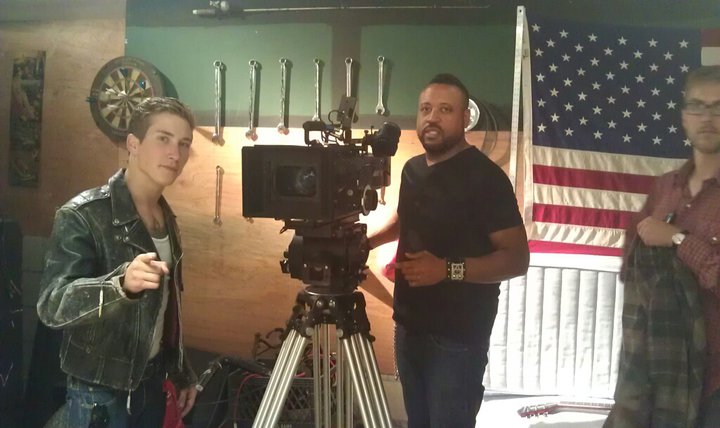 Talon Reid with director Bryan Barber on on set for 