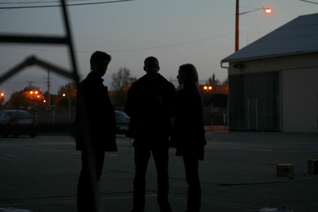 James Bachelor(left), Casey Stolberg(center), and Jessica Herman(right) having a meeting on the set of 