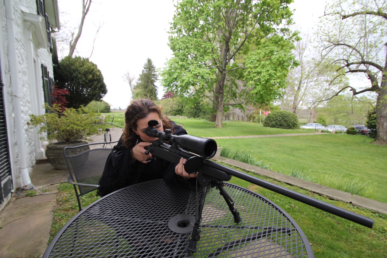 Looking through the rifle.