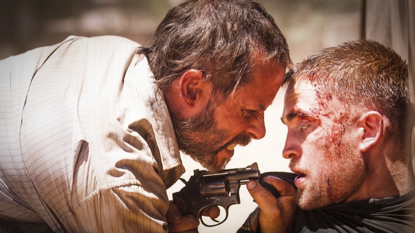 Still of Guy Pearce and Robert Pattinson in The Rover (2014)