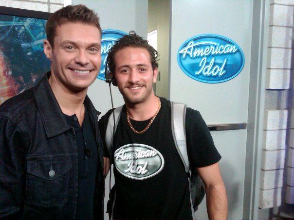 Ryan Seacrest with Vito Grassi while working on American Idol