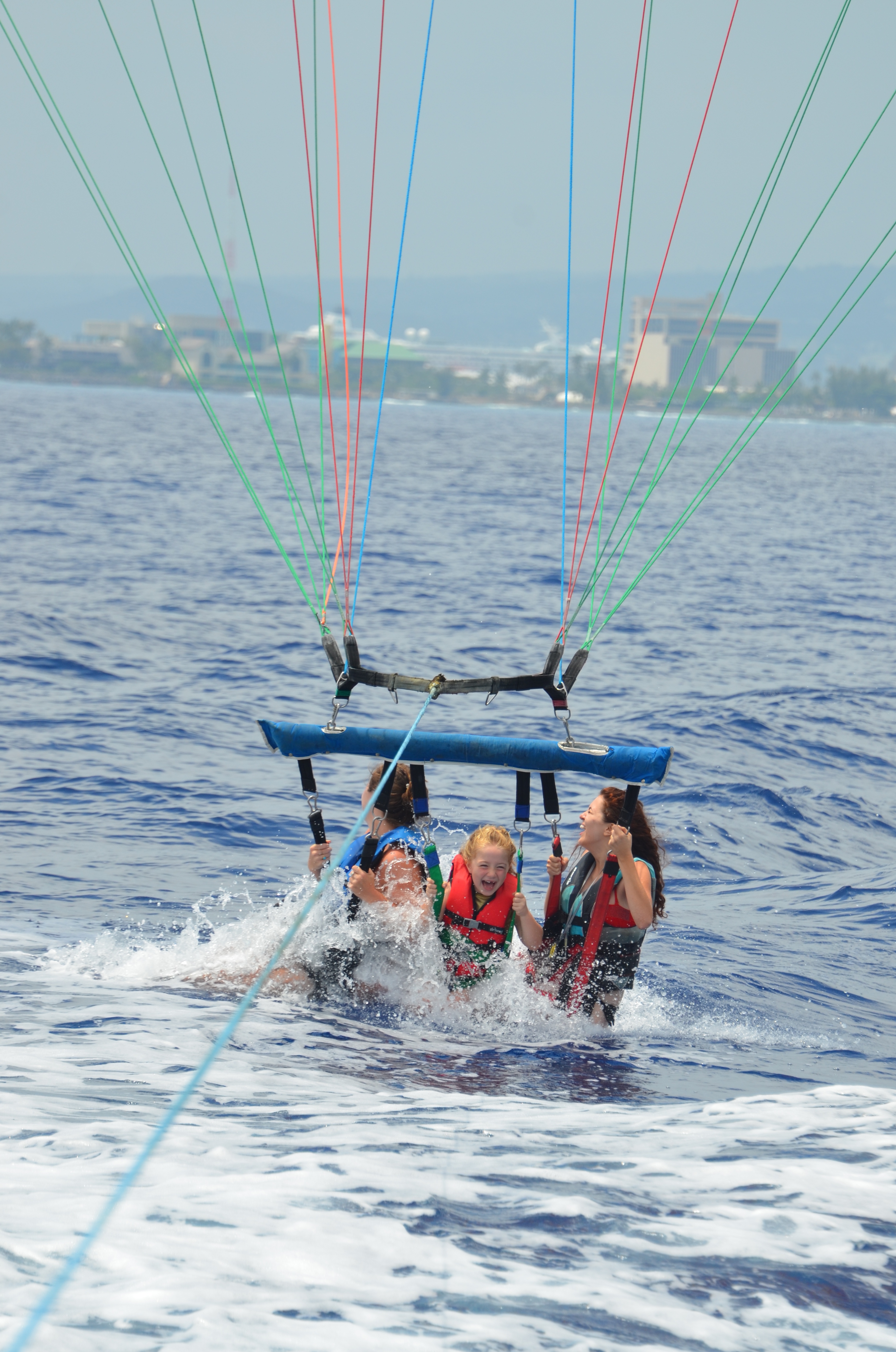 Rosanna's happily dipping in the Pacific Ocean after having lots of fun flying 600 Feet up in the air above it.