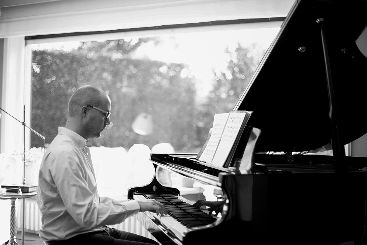 Composer Joris Hermy at the piano