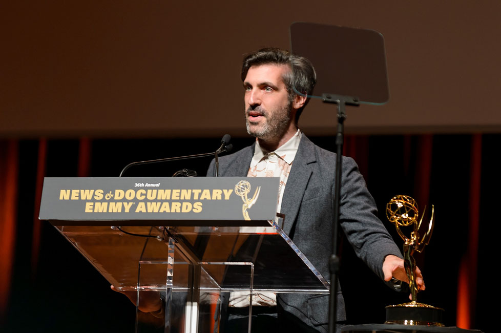 Tom Brass accepting a 2015 Emmy award for 'Outstanding graphic design and art direction.'