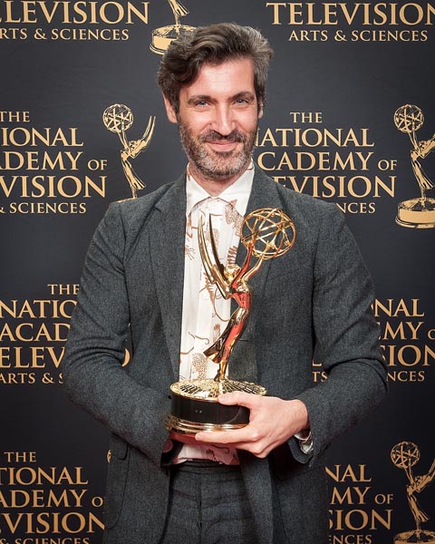 Tom Brass winning a 2015 Emmy award for 'Outstanding graphic design & art direction' for the PBS series, 'Your Inner Fish'