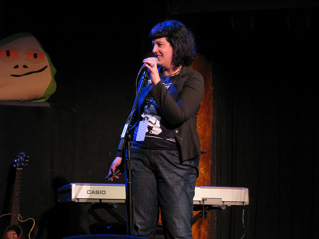 Bonnie Burton performing on stage at w00tstock in San Francisco.