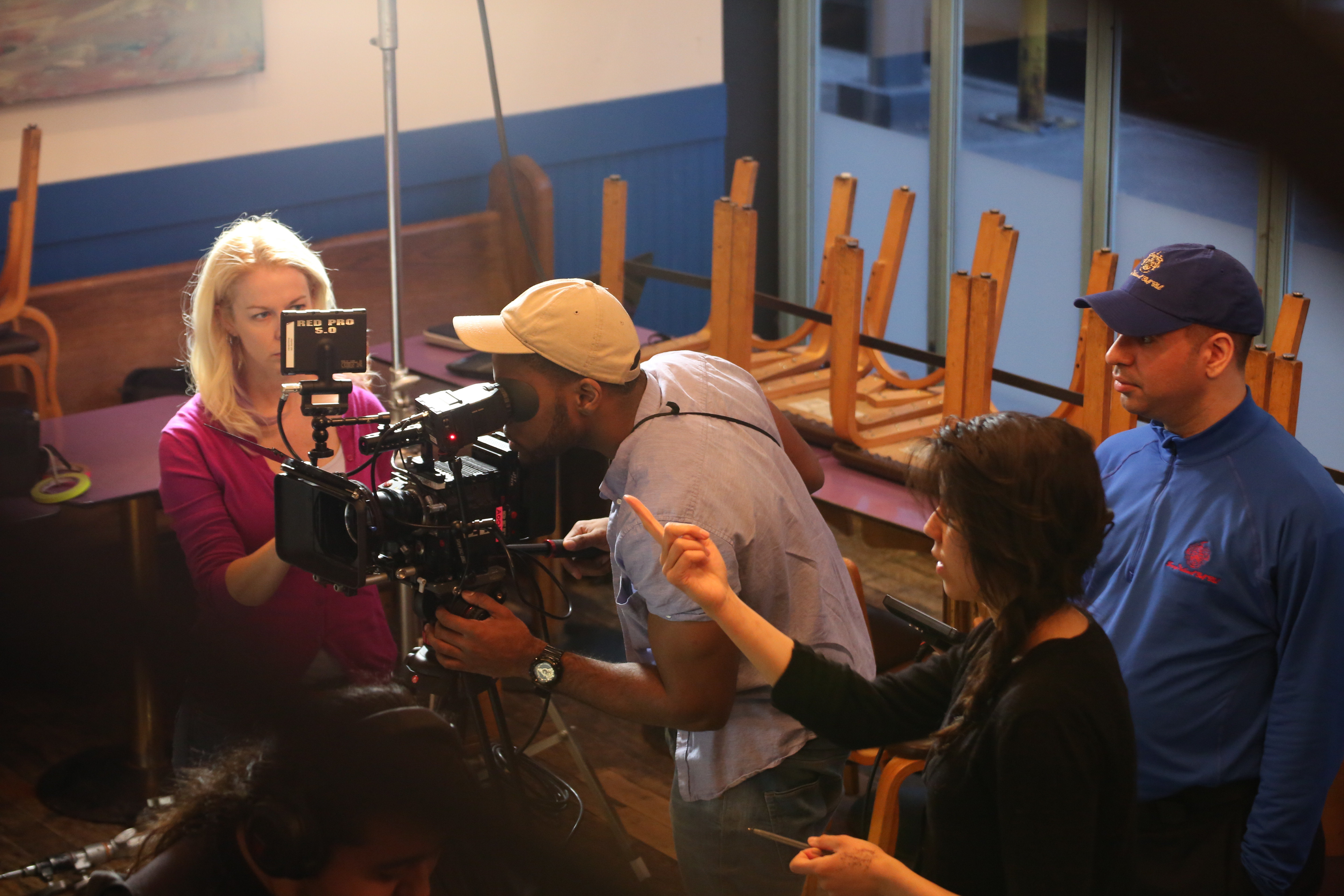 Director Usher Morgan and cinematographer Louis Obioha on set.
