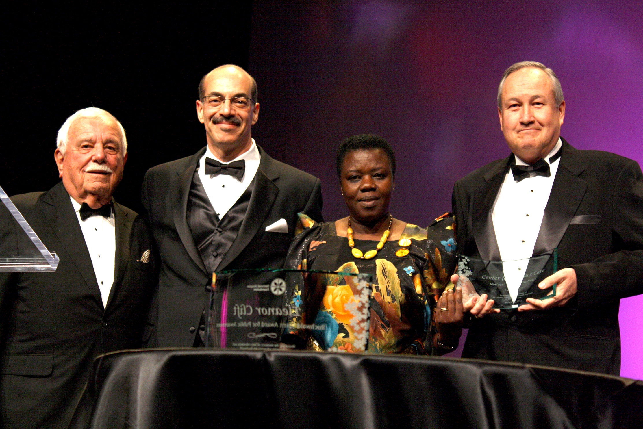 Pictured with Zach Morfogen, John Mastrojohn and Rose Kiwanuka accepting the Morfogen Art of Caring Award at the 2012 National Hospice Foundation Gala.