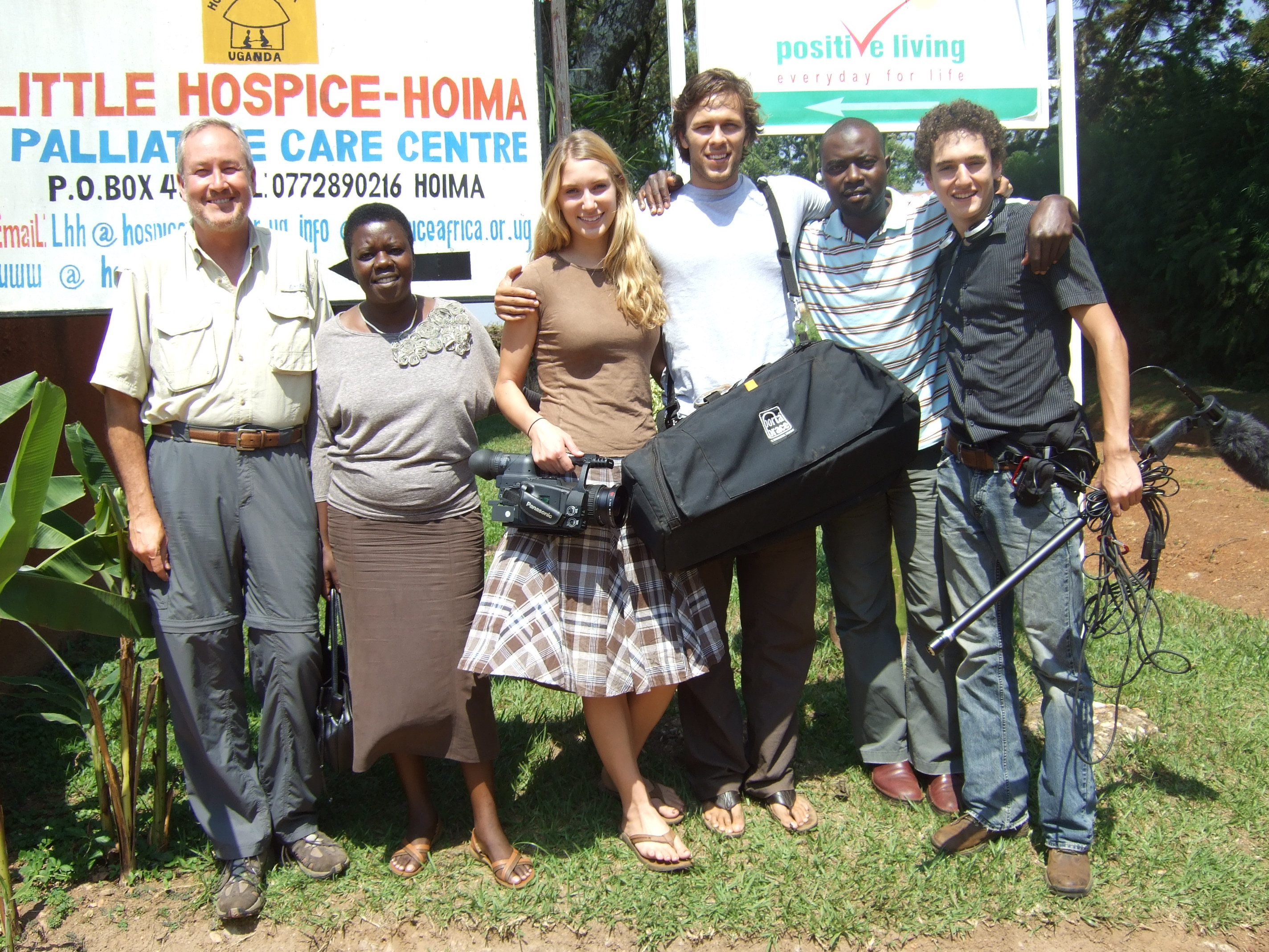 The Okuyamba film crew on location at Little Hospice Hoima, Uganda. L to R: Mike Wargo, Rose Kiwanuka, Michelle Carlisle Lee, Mike Lee, Mugisha (