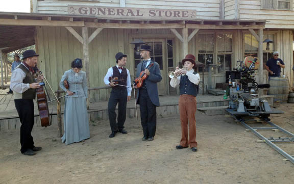 Max Manzanares plays trumpet for the quintet on the set of 
