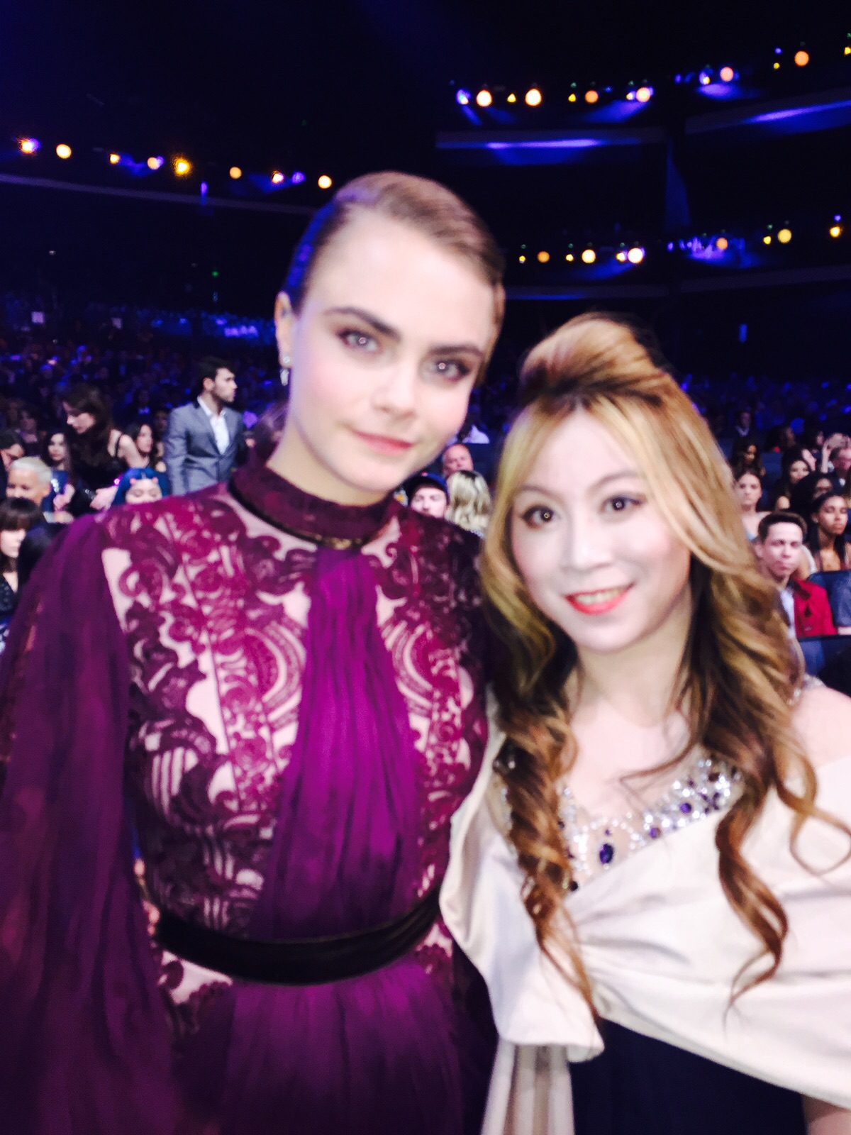 Actresses /model Cara Delevingne and Alice Aoki attend The 2015 MTV Movie Awards at Nokia Theatre L.A. Live on April 12, 2015 in Los Angeles, California.