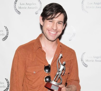 Eddie Navarro at the Los Angeles Movie Awards. Winning Best Experimental Film for Shadow Theory.