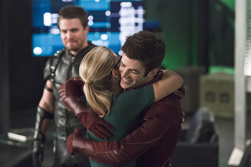 Still of Stephen Amell, Grant Gustin and Emily Bett Rickards in The Flash (2014)