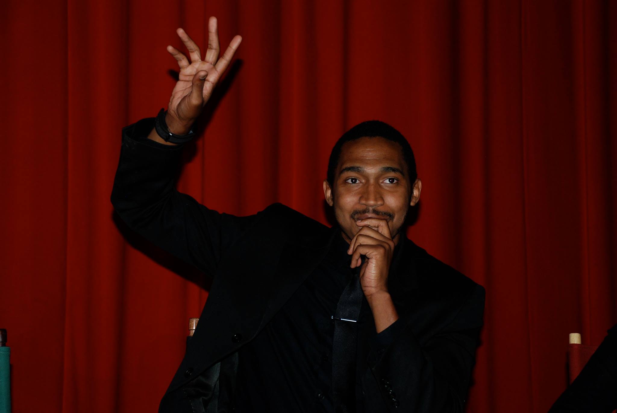 Noel Braham waving to the fans during the Dr.Mabuse Etiopomar Q and A premiere.