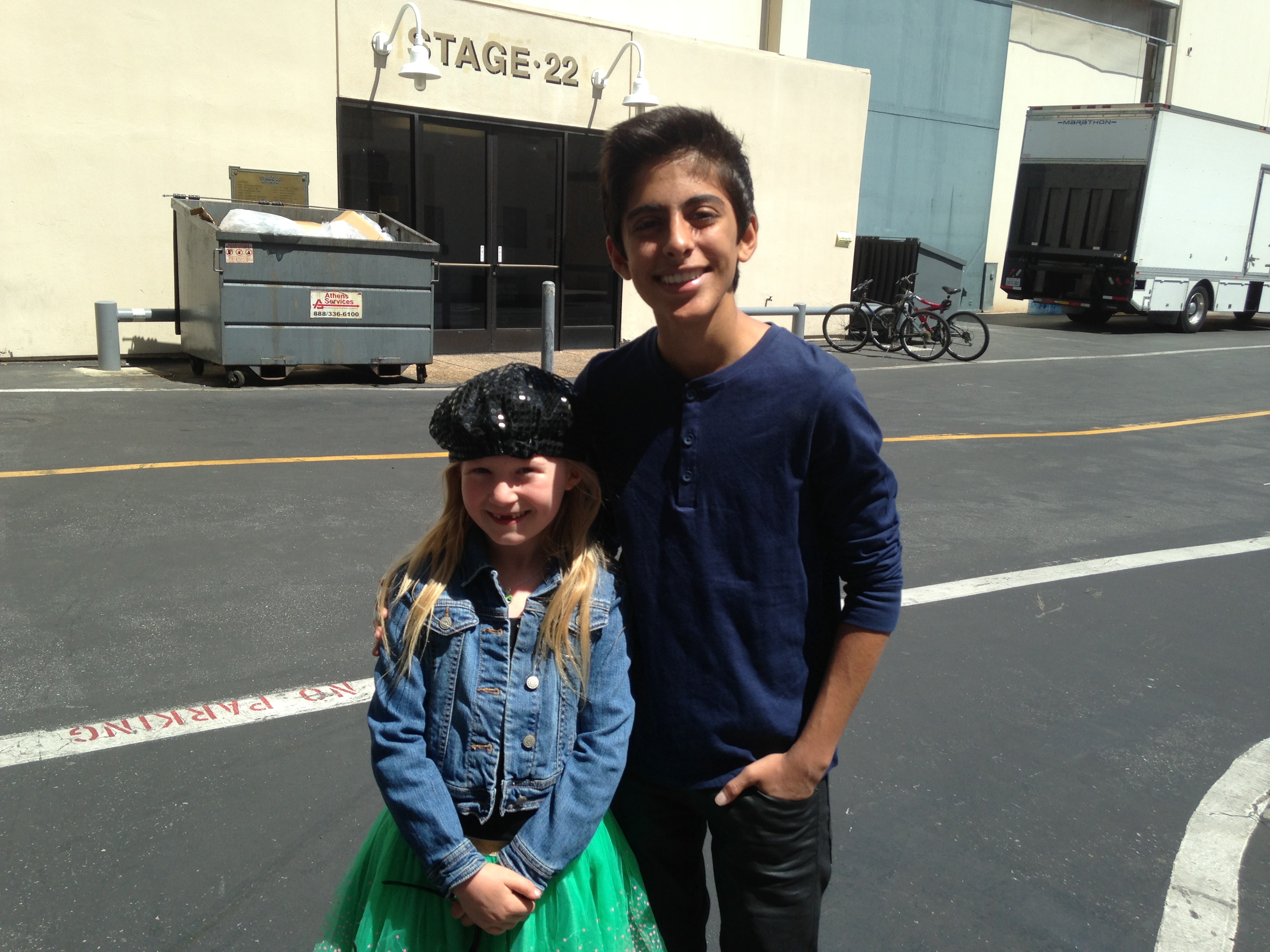 Actress Abigail Zoe Lewis meets Karan Brar at the Points of Light generationOn Block Party on April 18, 2015 in Los Angeles, California.