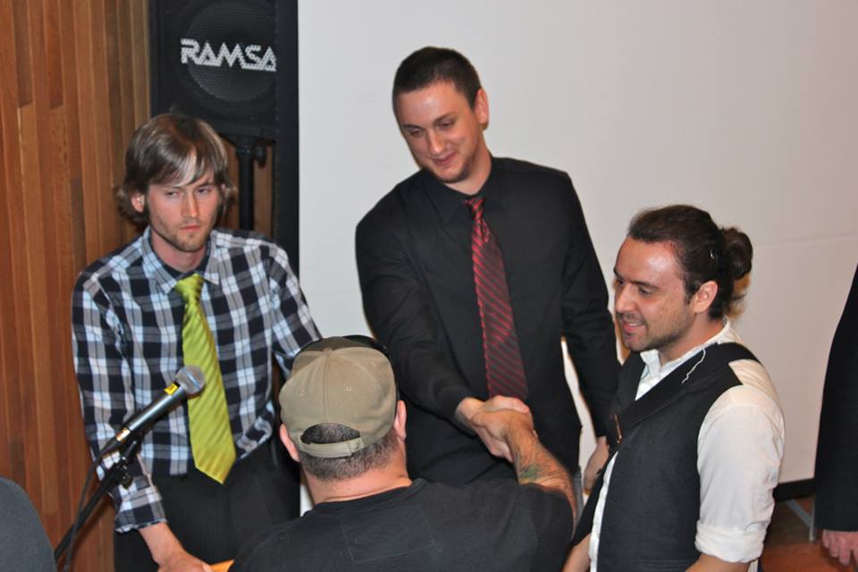 James Morris and Michael Christensen shaking hands after the premier of Absolution Is Now Public.