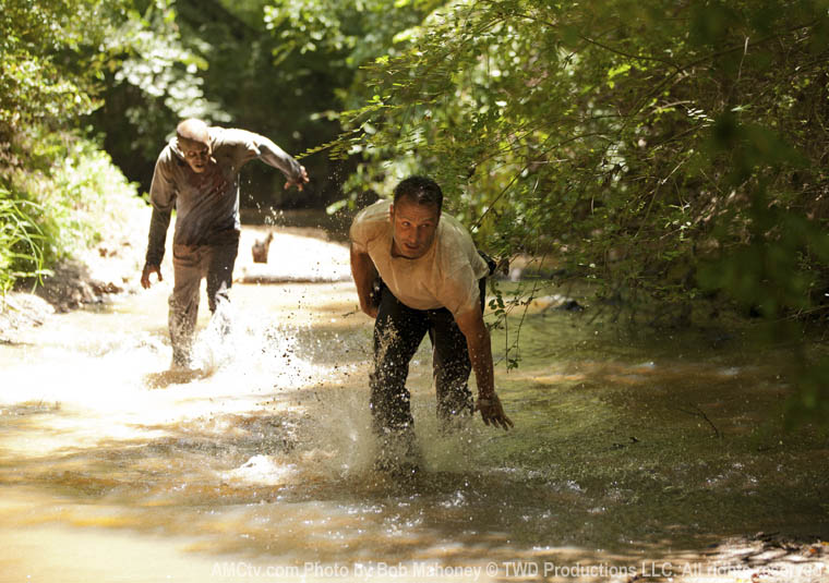 Action shot of Christopher W. Brantley with Andrew Lincoln(Rick Grimes) on the set of The Walking Dead