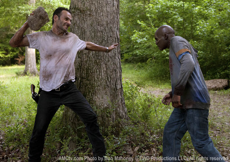 Action shot of Christopher W. Brantley with Andrew Lincoln(Rick Grimes) on the set of The Walking Dead