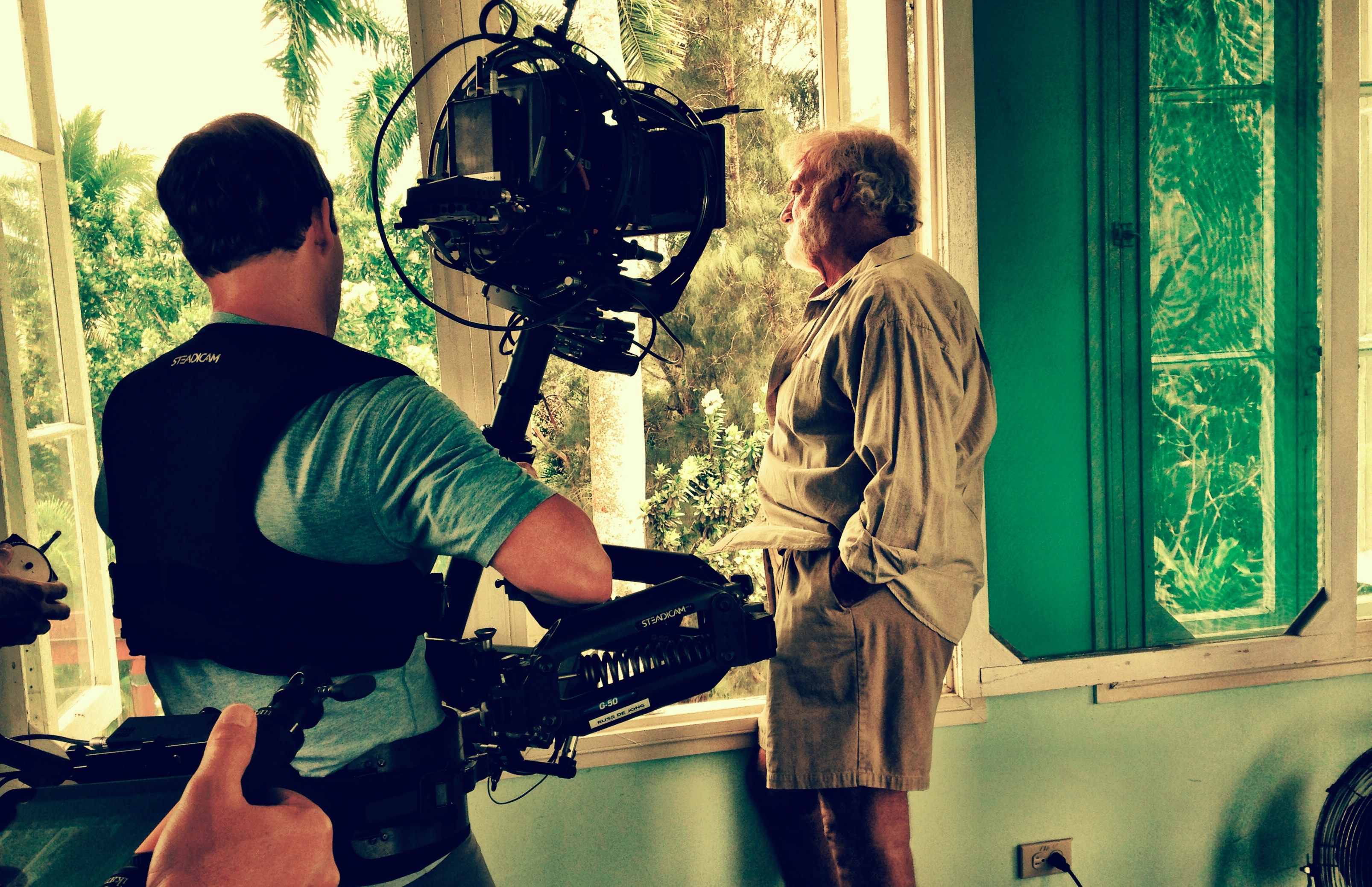 Adrian Sparks as Ernest Hemingway, being photographed by Steadicam Operator Russ De Jong in Hemingway's tower office, Finca Vigía, San Francisco de Paula, Cuba.