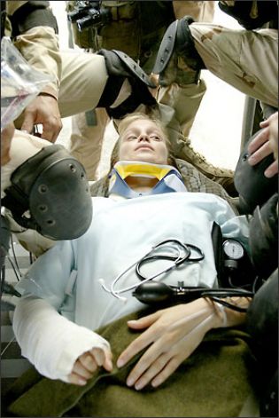 Laura Regan as Pfc. Jessica Lynch is rescued from an Iraqi hospital by American commandos in 