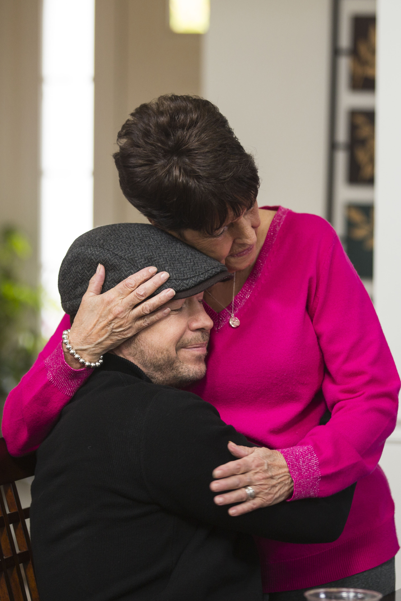 Still of Donnie Wahlberg and Alma McPeck in Wahlburgers (2014)
