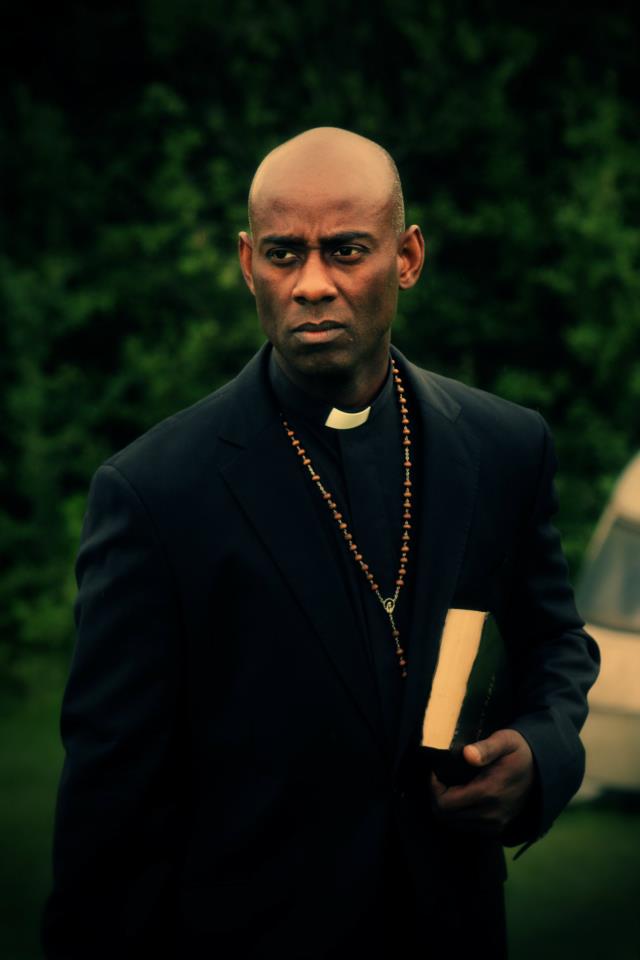 Rudy Barrow as Father Jan in Exorcist Chronicles