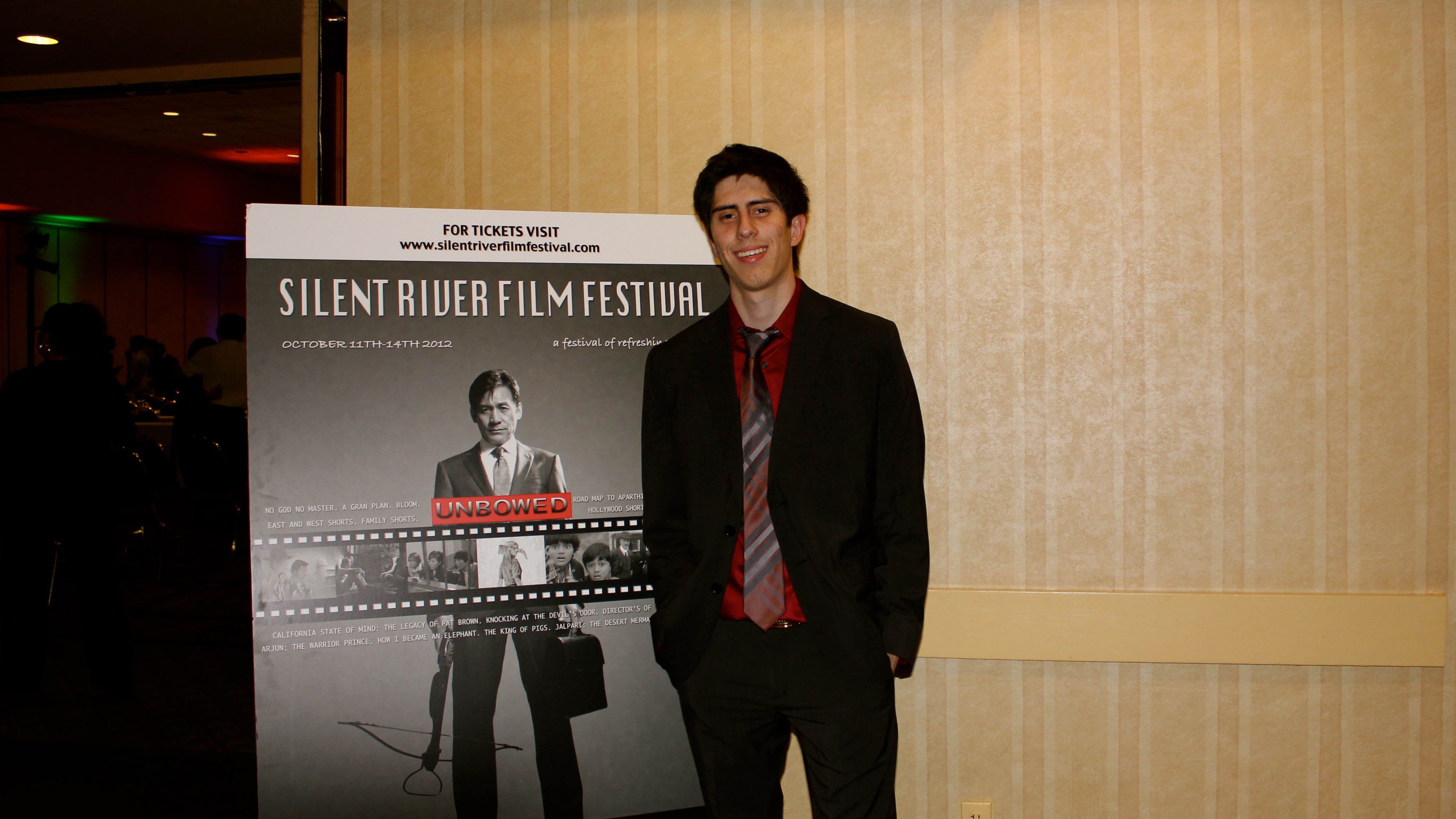 Addison Sandoval poses for photographers on the red carpet at the 2012 Silent River International Film Festival.