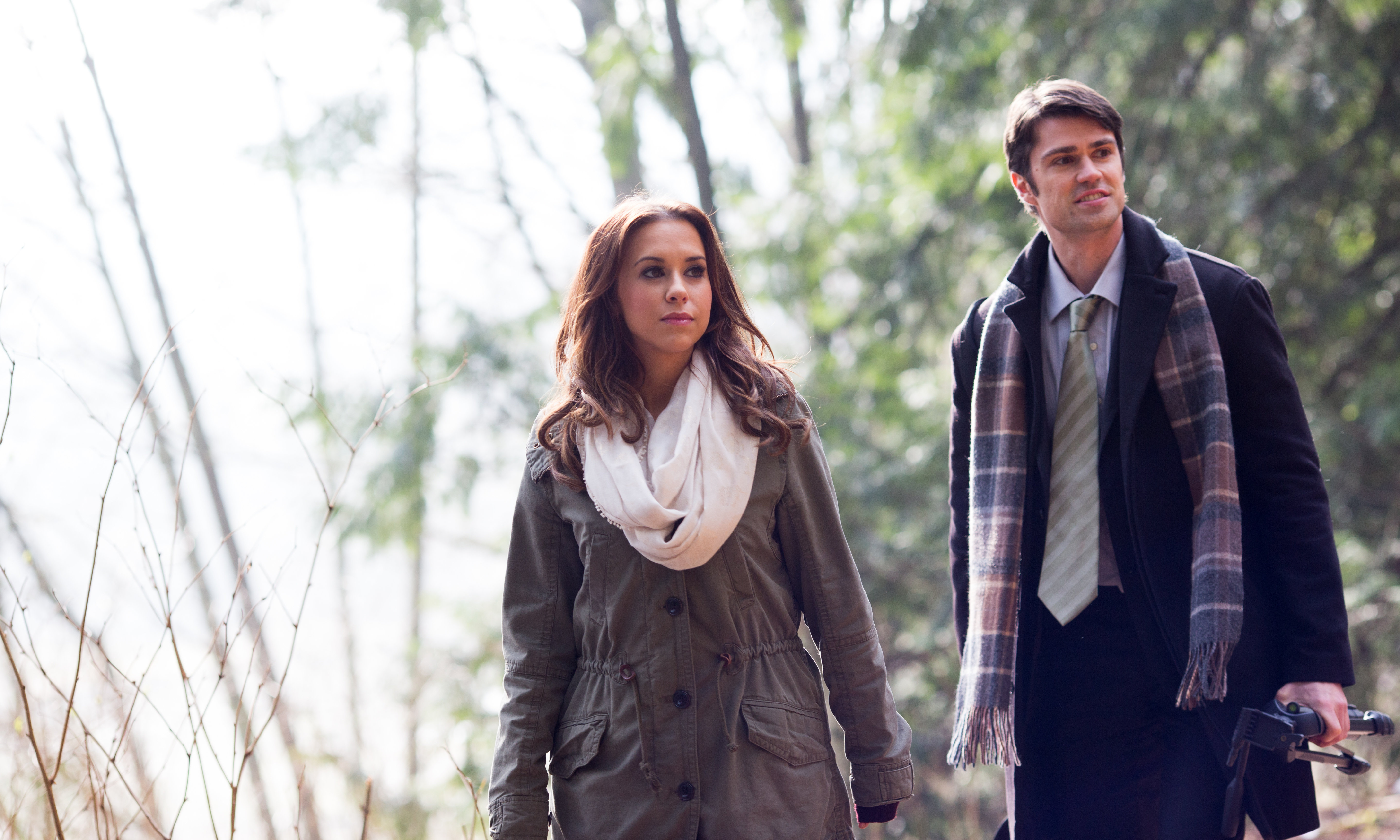Still of Lacey Chabert and Corey Sevier in The Tree That Saved Christmas (2014)