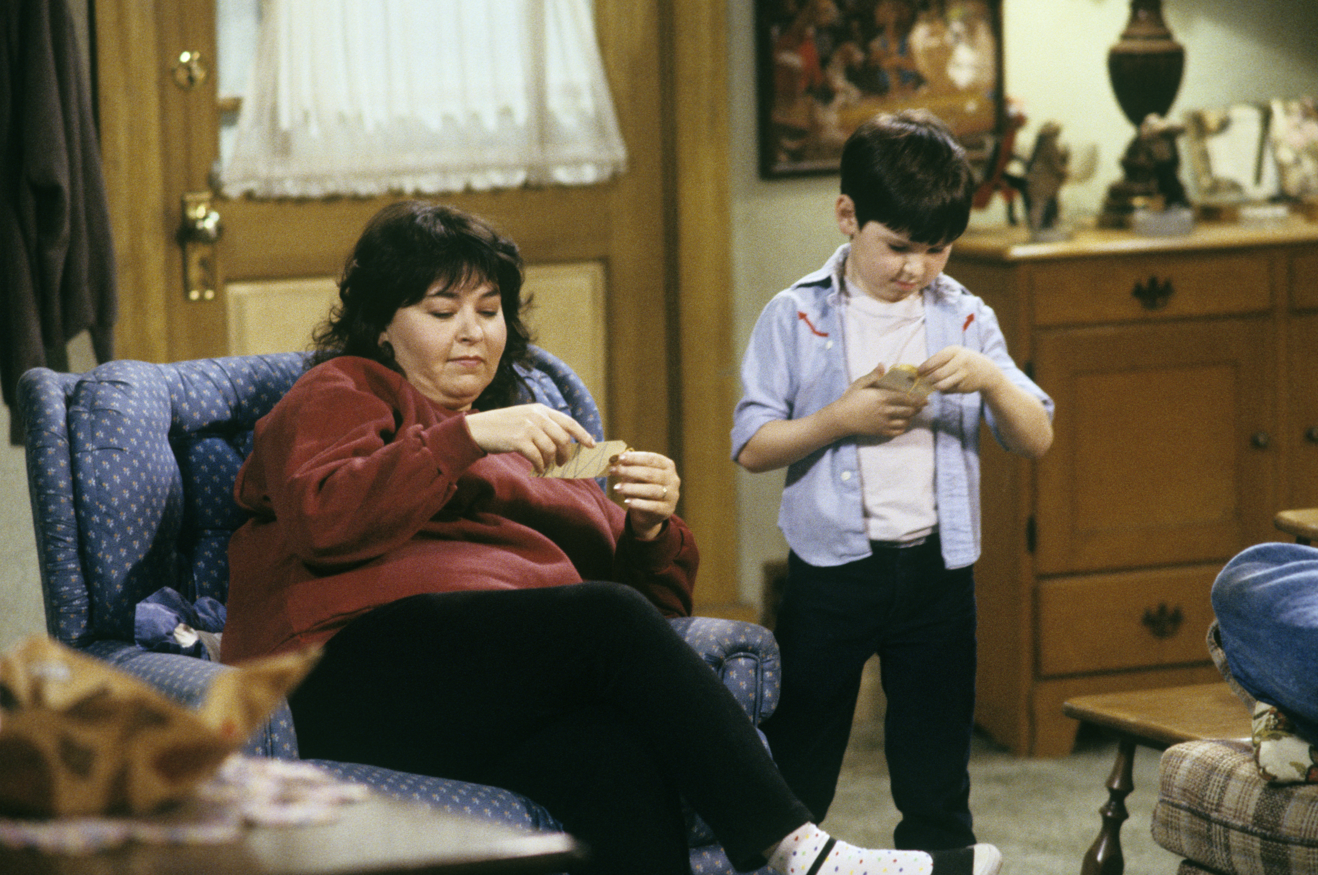 Still of Roseanne Barr and Michael Fishman in Roseanne (1988)