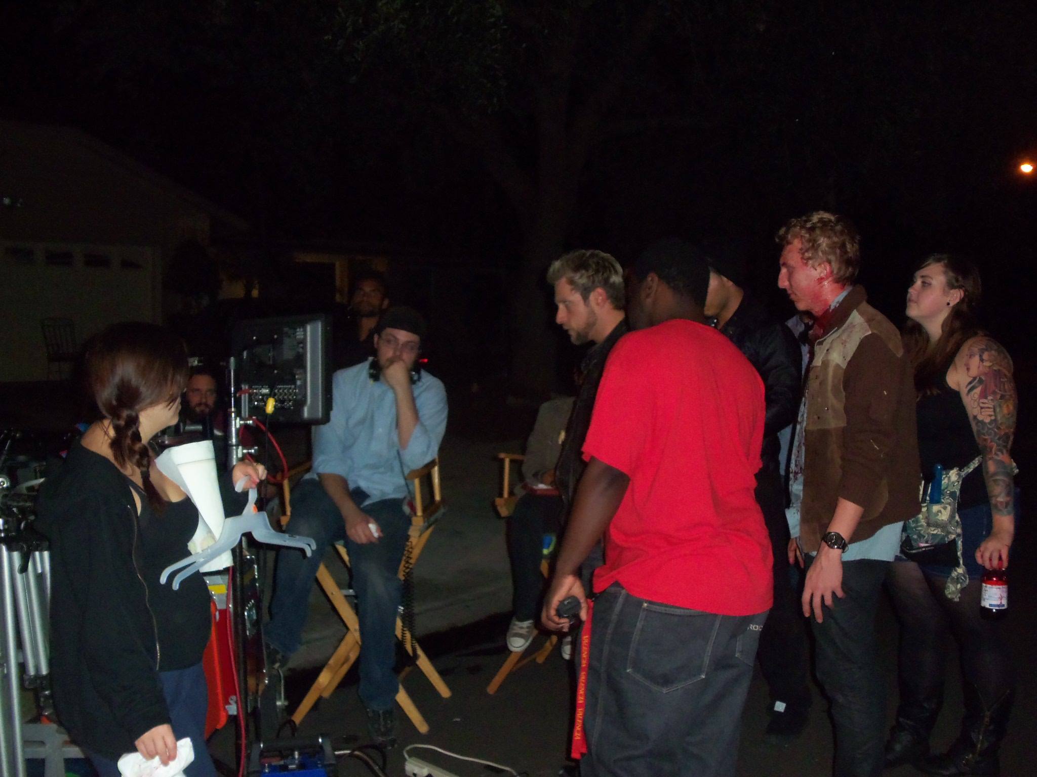 Jared Cooley (Director) watching playback on the set of Two Sided with Vincent DeMarco, Anthony James, and 1st AD Moe Fowler.