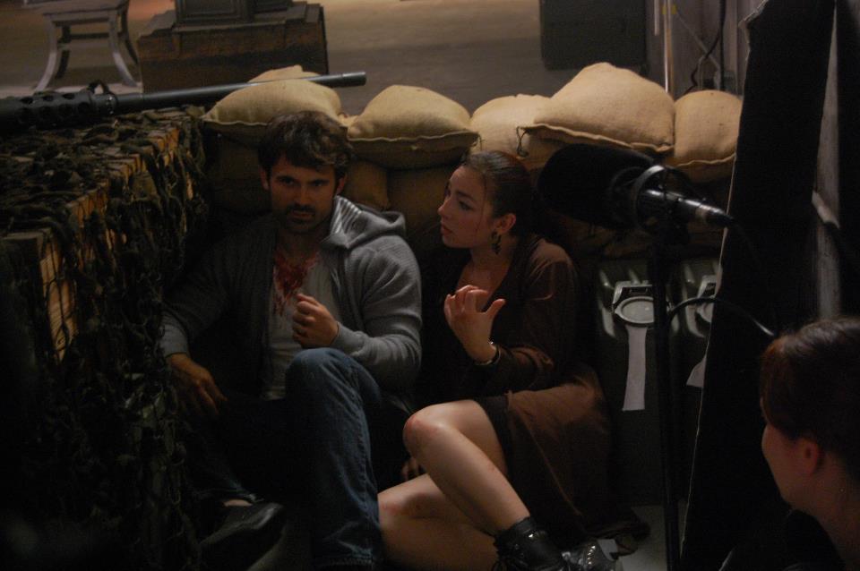 Rebecca Ahn and Eric Jacobus on set filming a scene from 