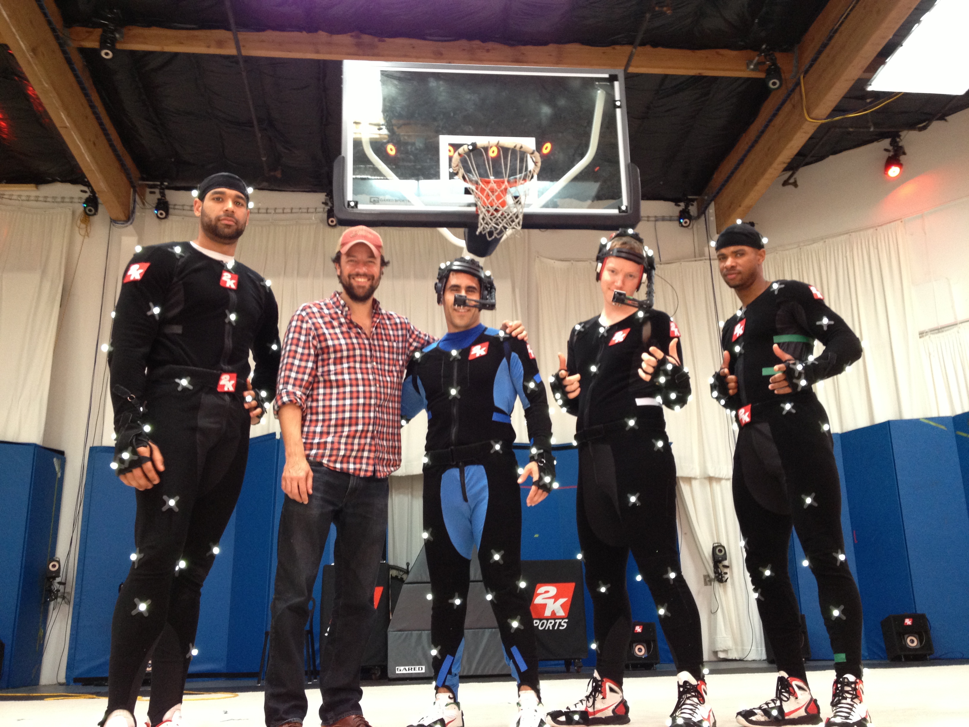 On set of NBA 2K14 at 2K games motion capture studio in Novato, CA. Pictured from Left to Right: 2K14 Motion Capture Player, Director Chris Papierniak, Trainer David Ojakian, MyPlayer Mark Middleton, 2K14 Motion Capture Player.