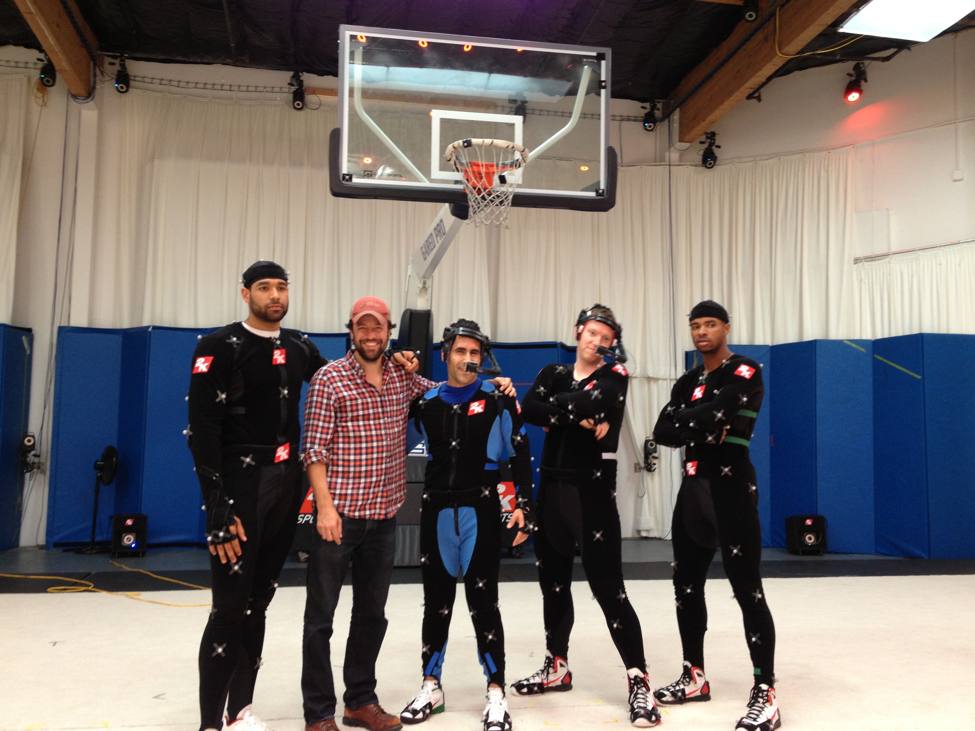 On set of NBA 2K14 at 2K games motion capture studio in Novato, CA. Pictured from Left to Right: 2K14 Motion Capture Player, Director Chris Papierniak, Trainer David Ojakian, MyPlayer Mark Middleton, 2K14 Motion Capture Player.