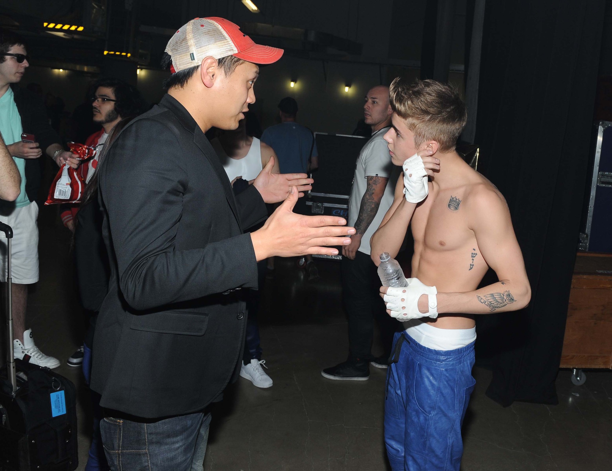 Still of Jon M. Chu and Justin Bieber in Justin Bieber.Tikek! (2013)