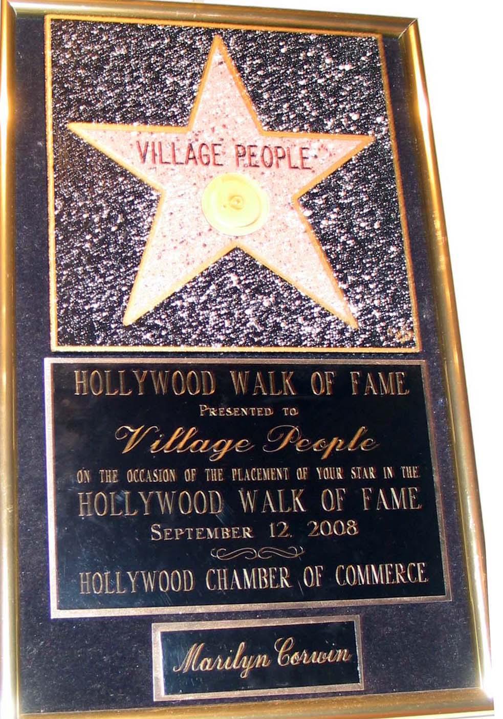 SEPTEMBER, 2008 Village People receive Star on Hollywood Walk of Fame. Marilyn was recognized for contributions in choreography, costume design and their 30 year friendship She received a plaque from the Village People and Hollywood Chamber of Commerce