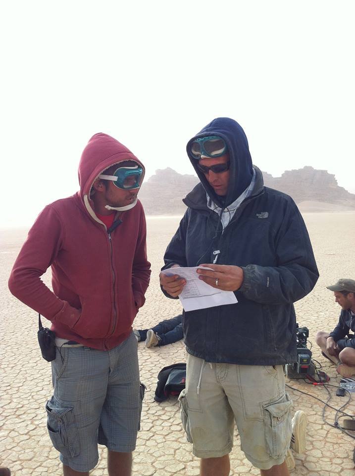 Wadi Rum right after a major sand storm almost wiped us out...Checking out the next days callsheet with my trusty 3RD AD (on the left).